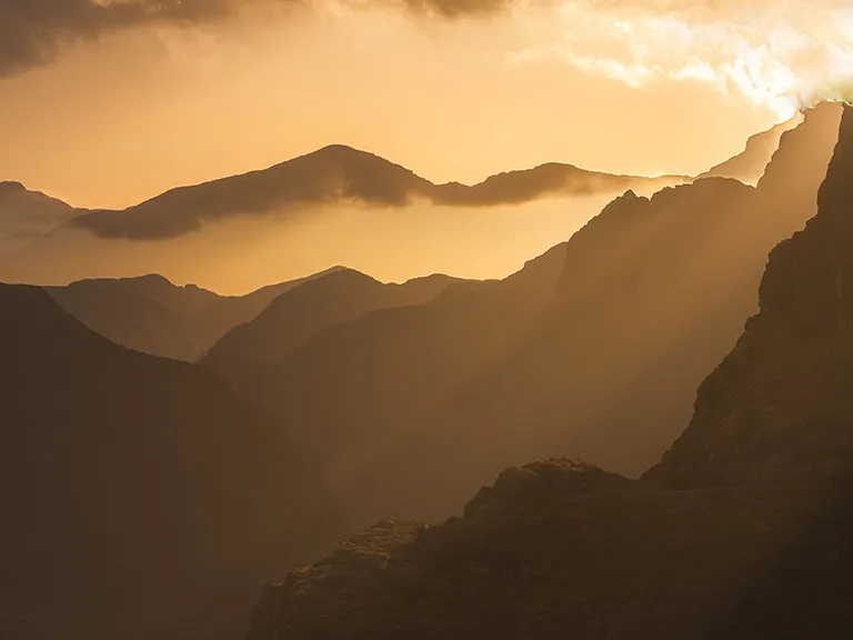 Sunset over mountains, Bhutan Sunset over mountains, Bhutan